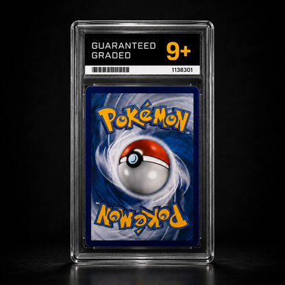 A graded Pokémon trading card in a clear plastic slab against a black background. The slab shows a black header with white and yellow text reading 'GUARANTEED GRADED 9+' and a barcode, with the Pokémon logo in yellow on the blue card insert.